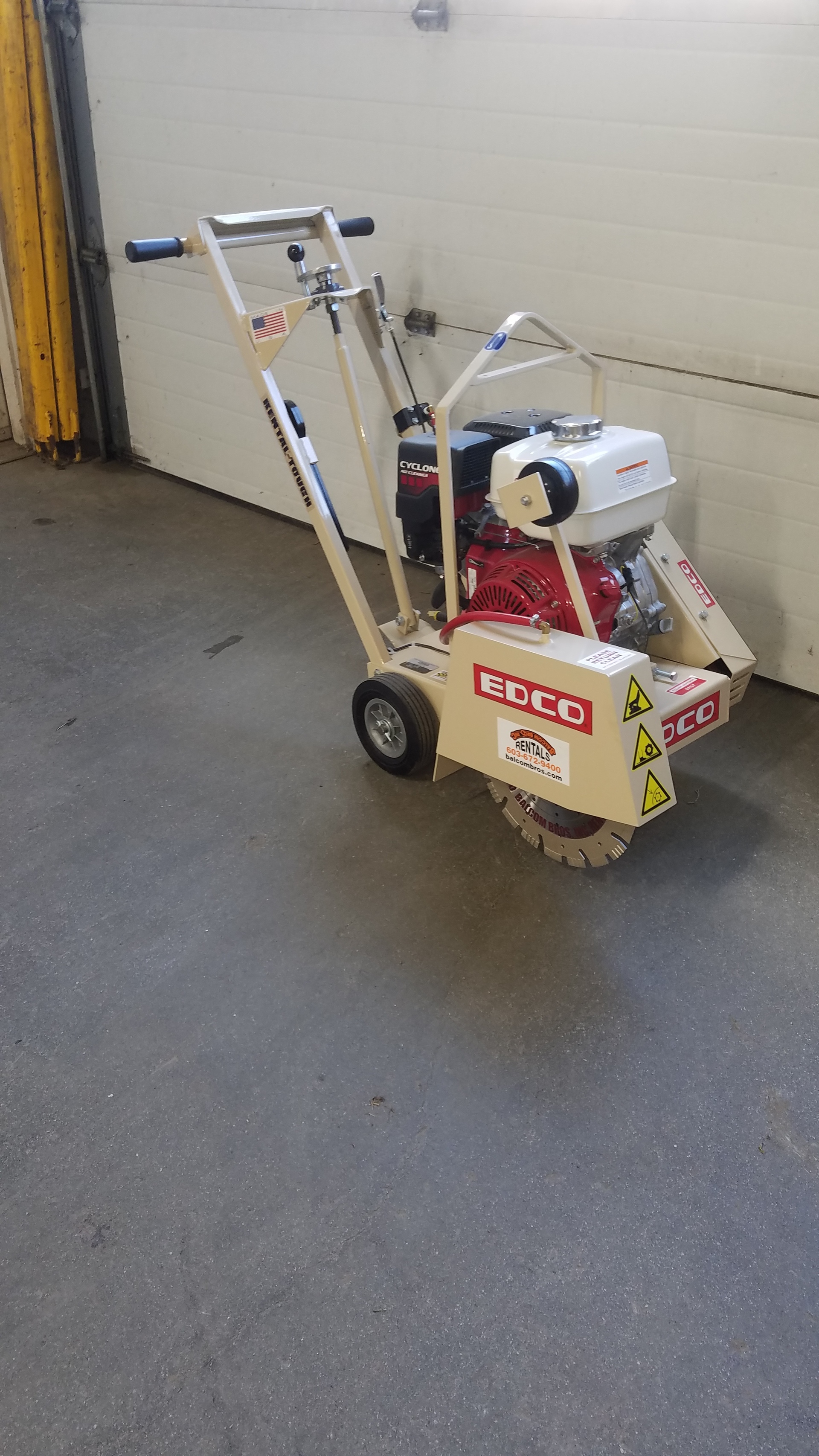 Walk-behind concrete saw